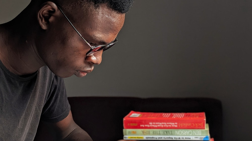 Man Reading Inside Room