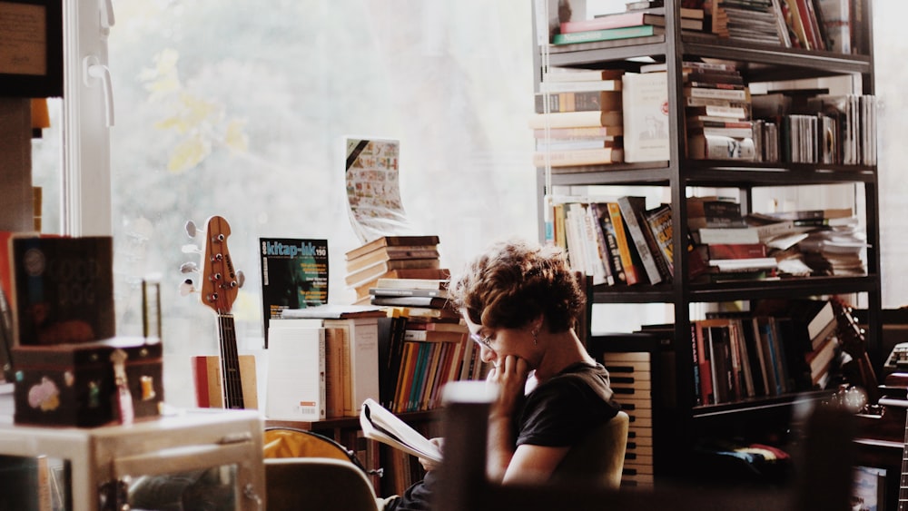 Reading with a Woman Beside a Keyboard